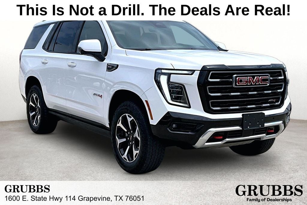2025 GMC Yukon AT4 in Summit White — front three-quarter view