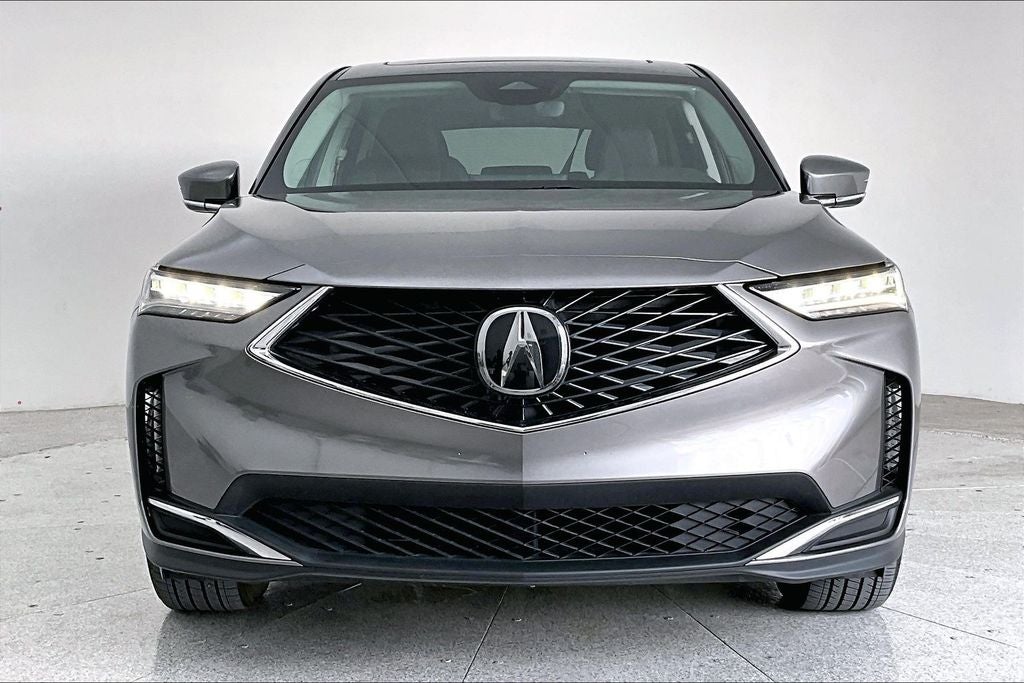 2025 Acura MDX — rear three-quarter view