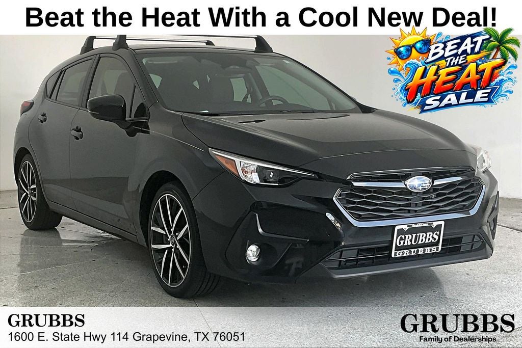 2024 Subaru Impreza Sport in Crystal Black Silica — front three-quarter view