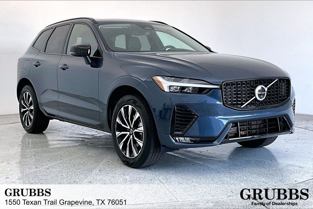 2025 Volvo XC60 B5 Plus in Denim Blue Metallic — front three-quarter view